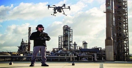 Inspection Technologies: Drone flying over the assets of a refinery.
