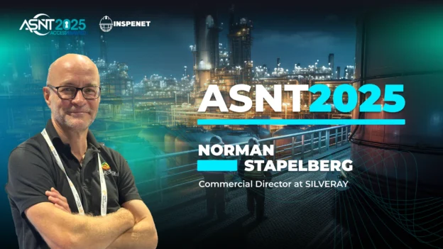 Norman Stapelberg, Silveray's Chief Commercial Officer, poses in front of an industrial backdrop during the ASNT 2025 convention, where he showcased innovations in weld scanning and digital X-ray detection.