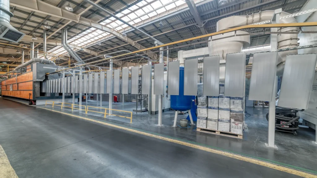 Batch powder coating system: equipment, automation and quality control for minimizing defects