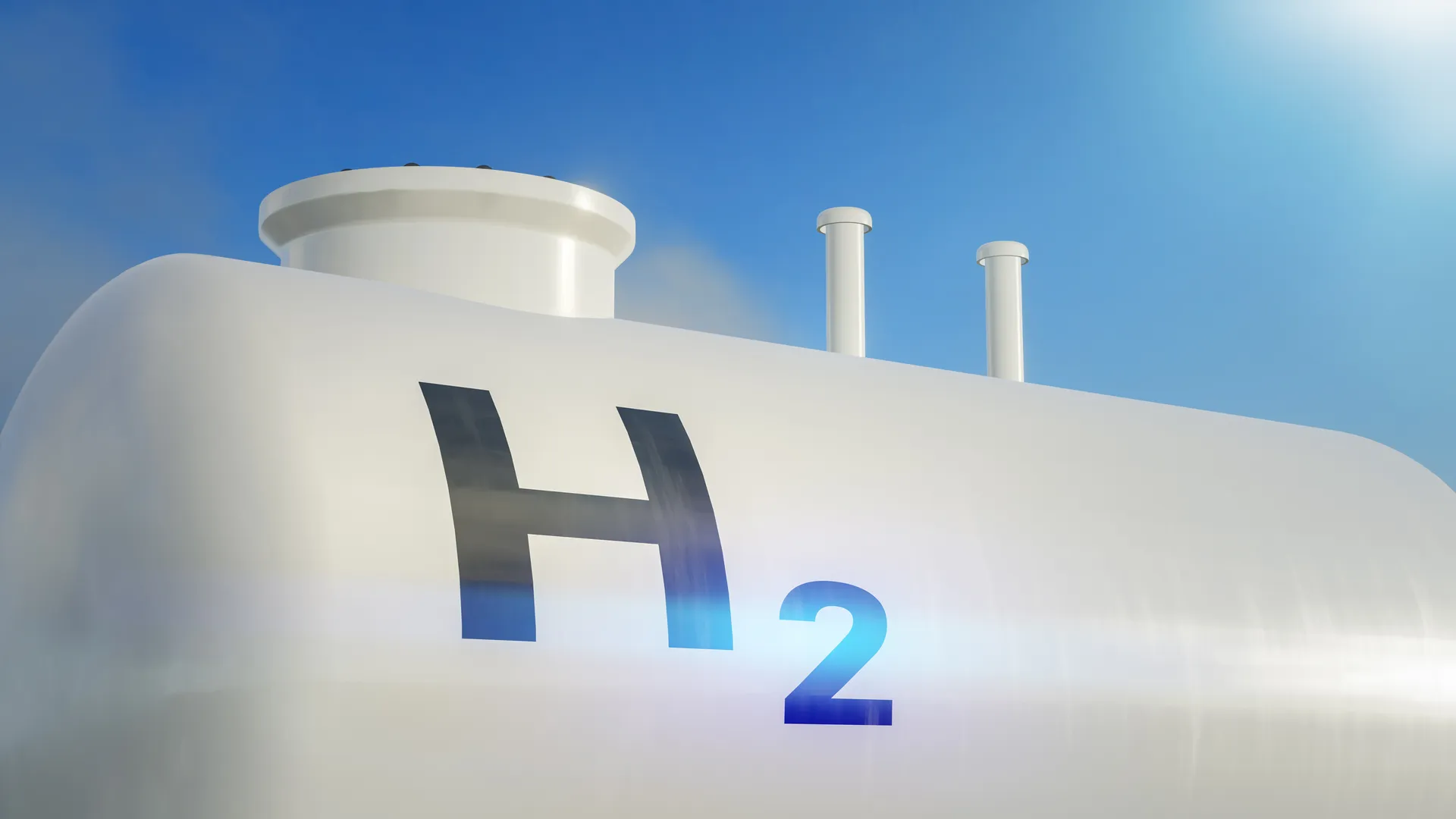 Industrial storage tank for Clean hydrogen (H2) under a clear sky, representing renewable energy infrastructure.