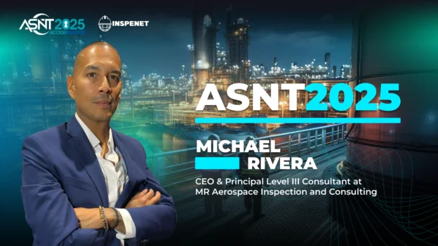 Michael Rivera poses in front of an illuminated industrial plant, with the ASNT 2025 and Inspenet logos in the background, during his participation in the ASNT 2025 conference.