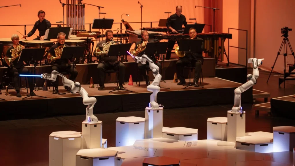Robot de tres brazos