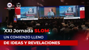 Vista del auditorio en la inauguración de la XXI Jornada SLOM 2025 en Panamá, con un panel de expertos en el escenario y una gran pantalla proyectando el acto.