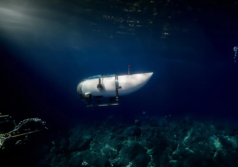 They recover parts of the Titan submarine and possible human remains