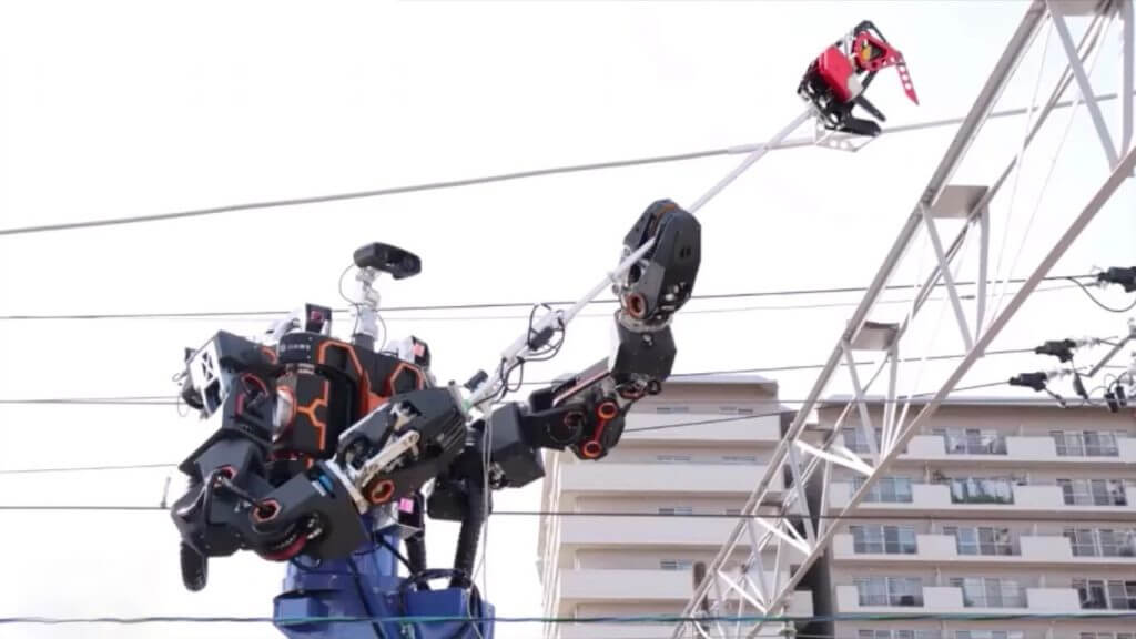 Giant Japanese robot repairs the cables of the railway network