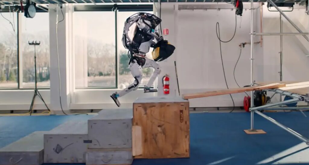 Boston Dynamics Robot Atlas Picks Up, Throws Objects, and Practices Parkour