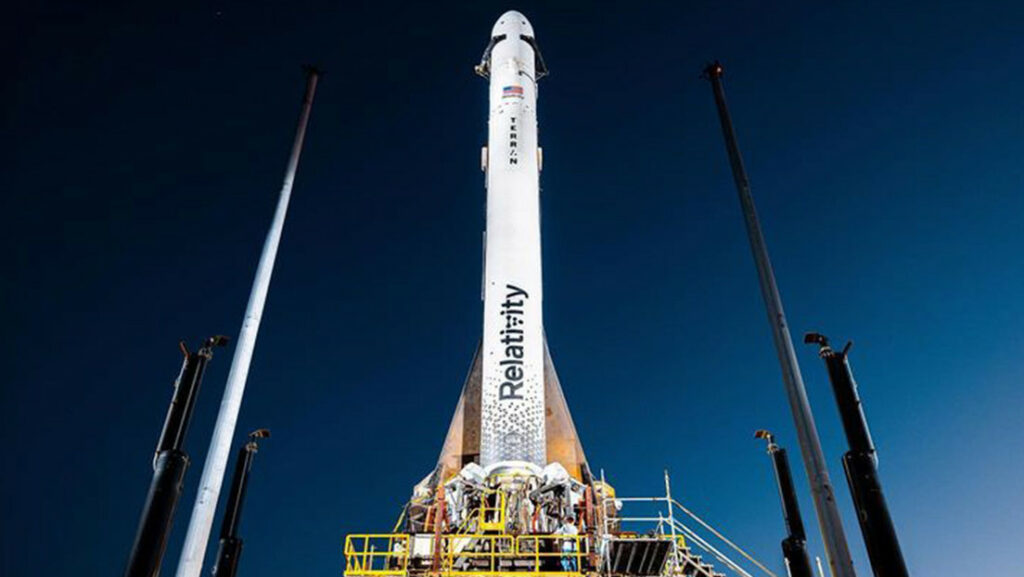 A 3D-printed rocket is stacked on a platform for its first launch
